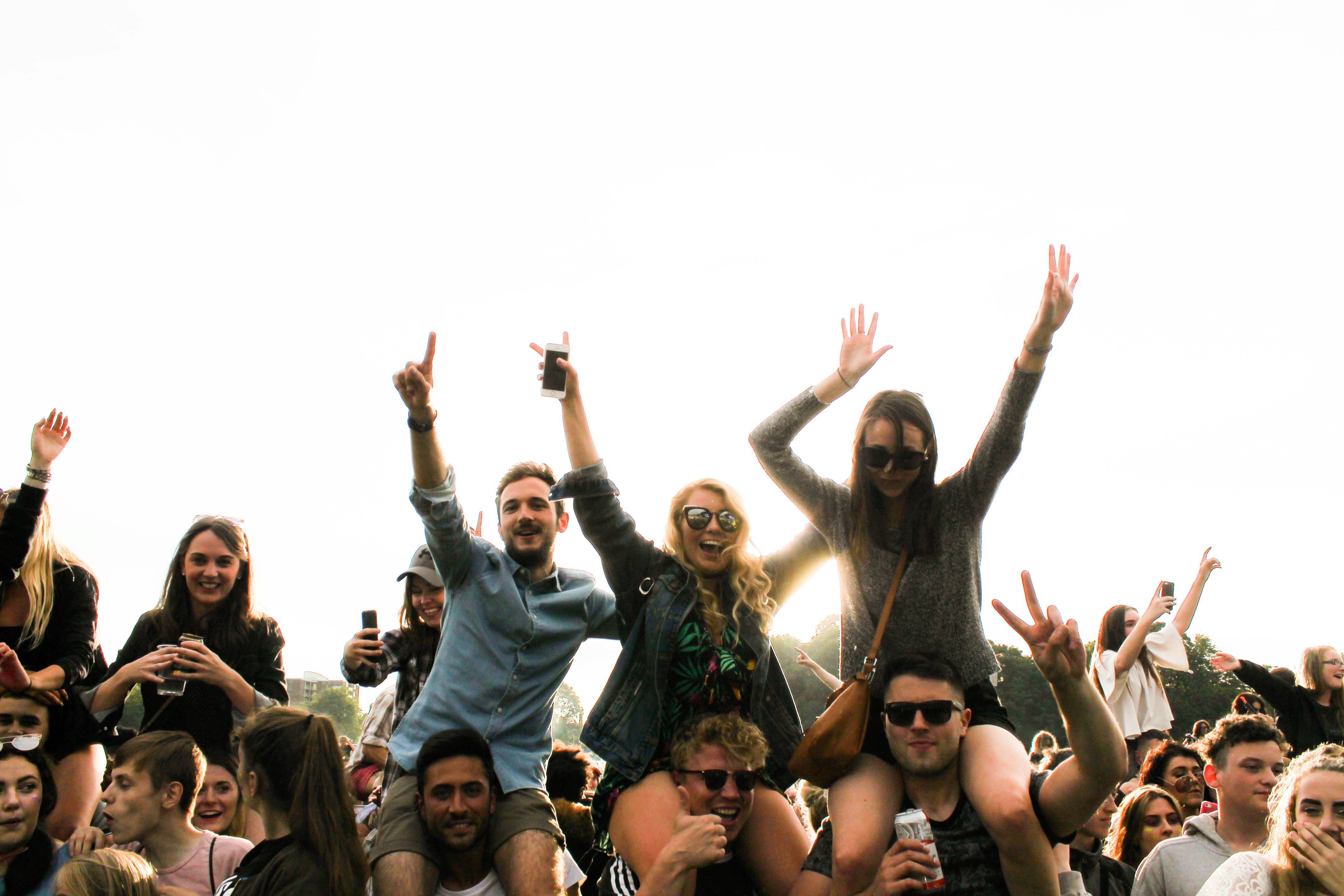 People Waving At Festival